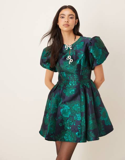 Vestido corto verde esmeralda con mangas abullonadas, detalle de lazos y patrón de jacquard de Sister Jane - view 1