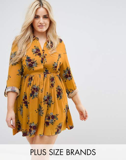 Vestido de día mostaza con estampado floral con detalle de cuello y manga larga de Club L Plus