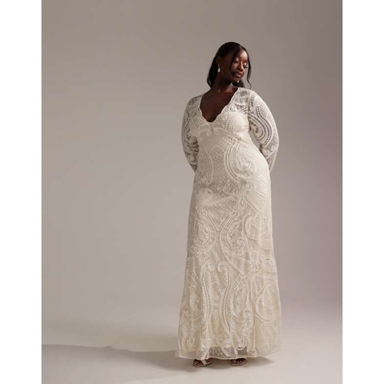 Vestido de novia largo color marfil escotado de manga larga con