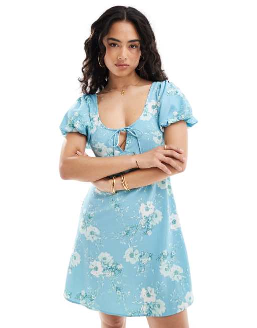 Vestido de tarde corto con estampado floral y mangas abullonadas de ASOS DESIGN