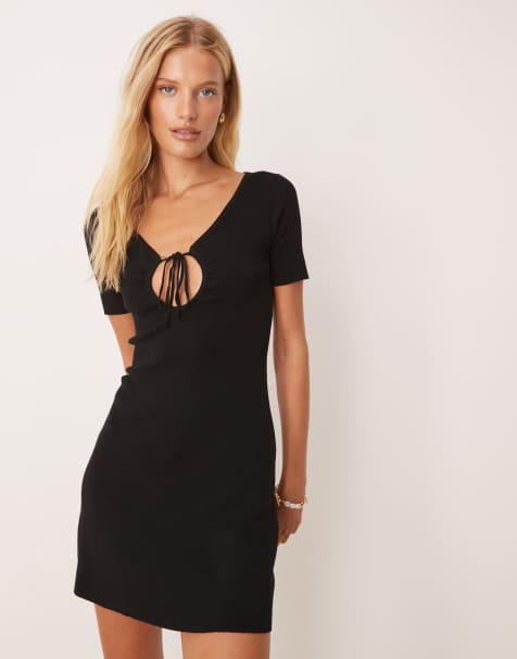 Vestido de tarde corto negro con detalle de lazada de punto compacto de Mango - view 1