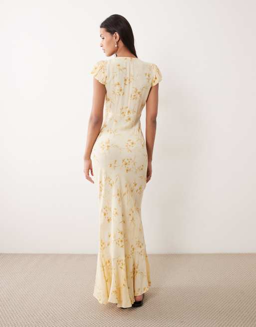 Vestido de tarde largo amarillo con estampado floral, cuello de pico y mangas abullonadas de ASOS DESIGN, 3 de 4