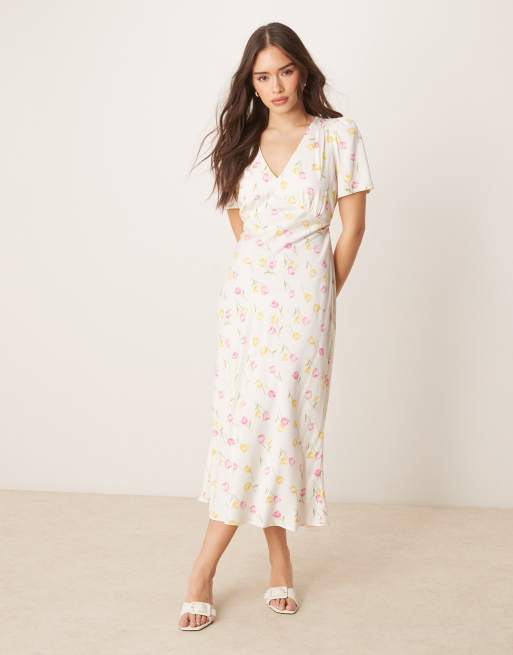Vestido de tarde midi color crema con estampado de tulipanes Flora de Nobody's Child