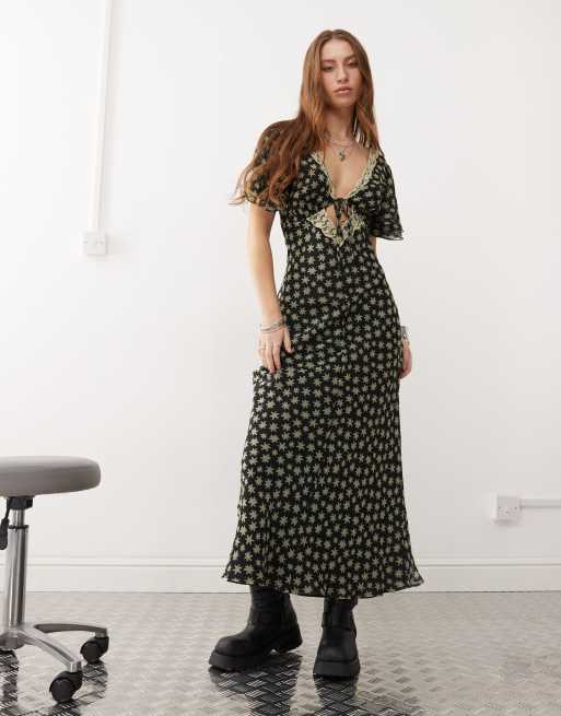 Vestido de tarde midi con estampado de estrellas de Reclaimed Vintage