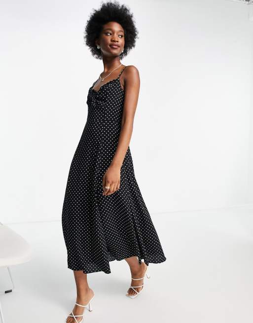 Vestido de tarde midi negro con lunares, lazada en la parte delantera y abertura hasta el muslo de Forever New