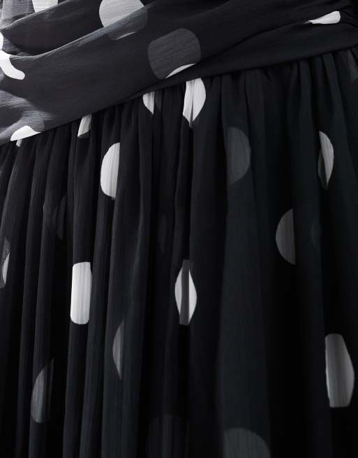 Vestido largo asimétrico con manga larga abullonada y estampado de