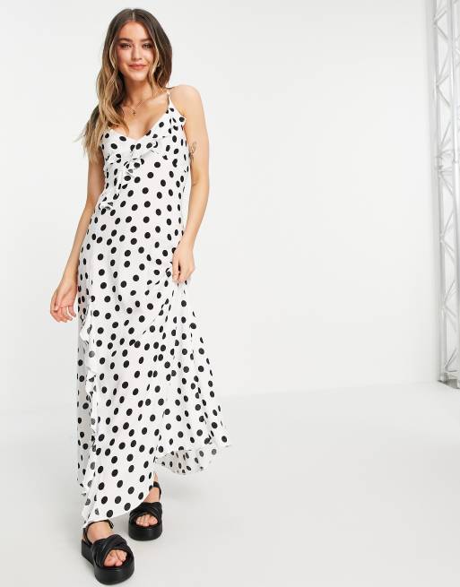 Vestido largo blanco con lunares, volantes y diseño de la de DESIGN | ASOS