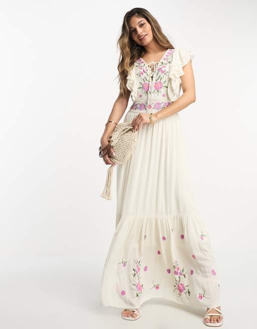 Vestido largo color crema con bordados de Y.A.S 