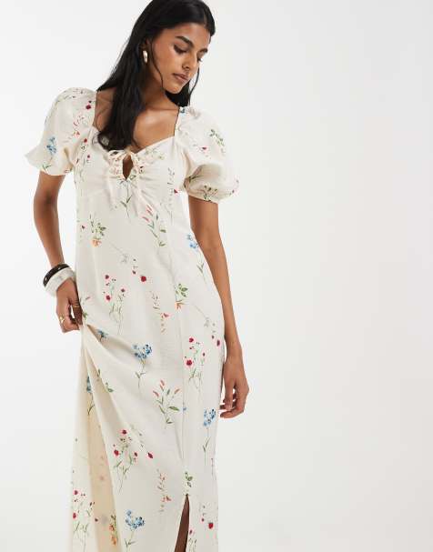 Vestido largo color crema con estampado floral, mangas abullonadas y detalle de lazada delantera de Vero Moda - view 1