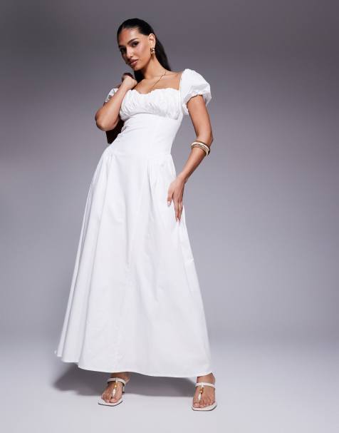 Vestido largo color crema de estilo mesonera con mangas abullonadas y detalle de pliegues en la cintura de algodón exclusivo de Kaiia - view 1