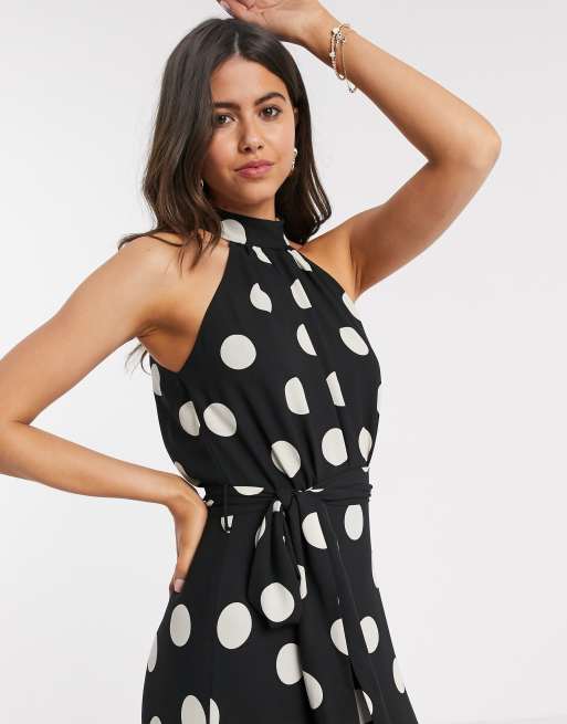 boxeo Comprimido Delegación Vestido largo con cuello halter a lunares en negro de Mango | ASOS