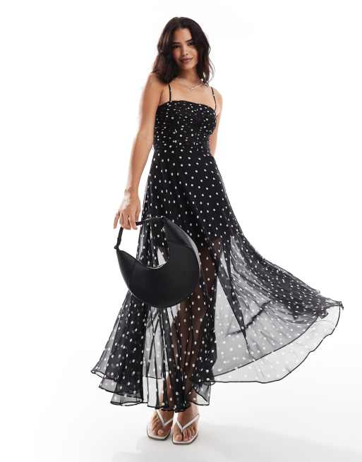 Vestido largo con cuerpo fruncido y estampado de lunares de tejido semitransparente de Forever New