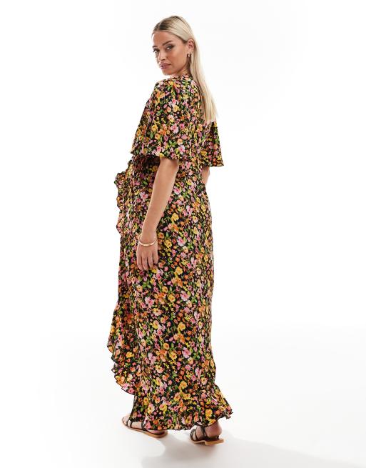 Vestido largo cruzado en la parte delantera con estampado floral sobre base oscura de Vero Moda Maternity, 2 de 4