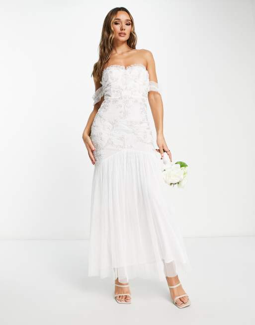 Vestido largo de novia color marfil con falda de corte sirena de Maya