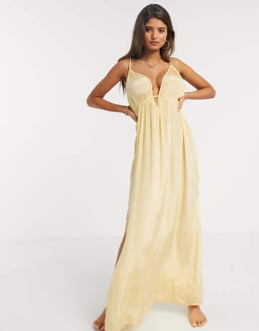 Vestido largo de playa en amarillo dorado con copas grandes, escote de pico en la parte delantera y detalle de cuerda de ASOS DESIGN