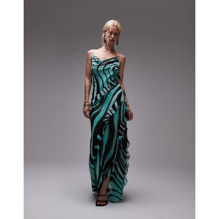 Vestido largo lencero azul de corte al bies con estampado de cebra