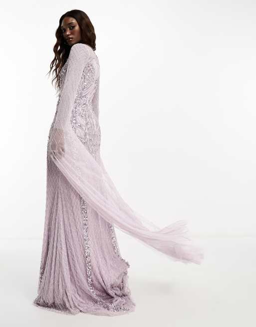 Vestido largo lila con diseño adornado y mangas exageradas de Beauut, 4 de 4
