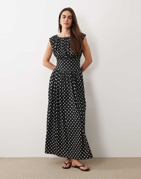 Vestido largo monocromático sin mangas con estampado de lunares y cintura ceñida de ASOS DESIGN - view 1