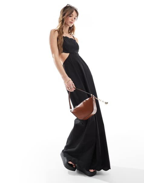 Vestido largo negro con bordes festoneados y espalda abierta con cordones exclusivo de The Frolic - view 1