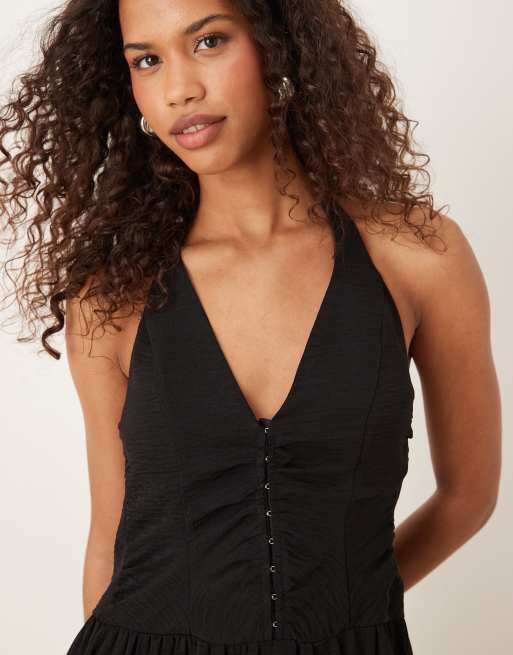 Vestido largo negro con cuello halter y cuerpo estilo corsé de ASOS DESIGN, 3 de 4