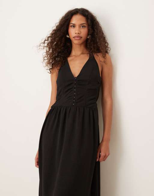 Vestido largo negro con cuello halter y cuerpo estilo corsé de ASOS DESIGN, 4 de 4