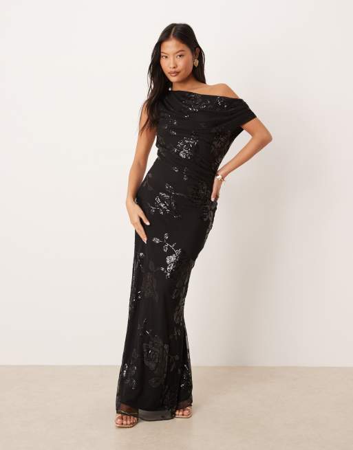 Vestido largo negro con escote asimétrico de lentejuelas de Gina Tricot Petite