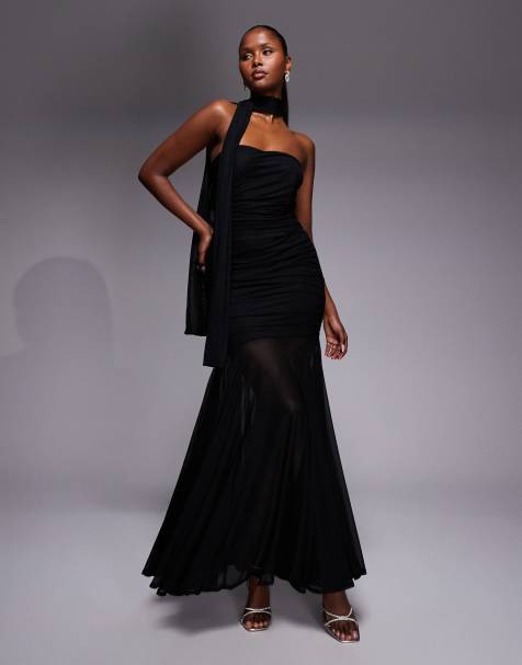 Vestido largo negro con escote palabra de honor, falda de corte amplio transparente y detalle de fular de TFNC - view 1