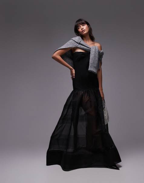 Vestido largo negro con escote palabra de honor y falda traslúcida de capas de la colección cápsula de Mango - view 1