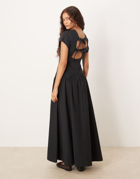 Vestido largo negro de estilo camiseta con cintura baja y detalle de lazada de ASOS DESIGN - view 1