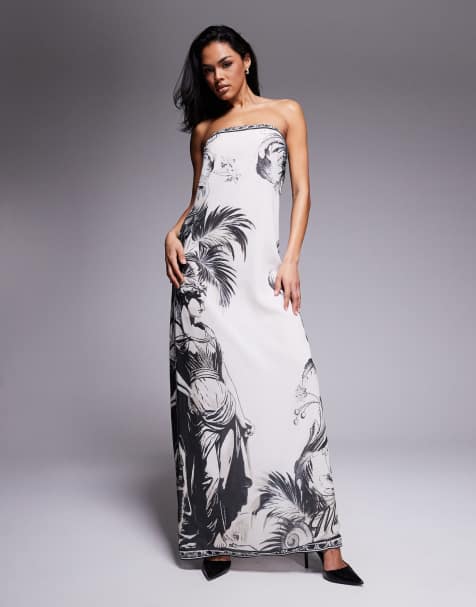 Vestido largo negro y blanco de corte trapecio con estampado de palmeras y escote palabra de honor de chifón exclusivo de Murci - view 1