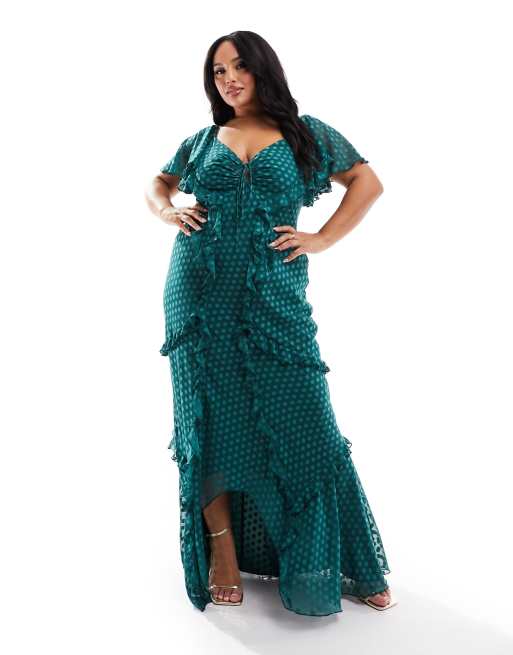 Vestido largo verde con mangas acampanadas, volantes, detalle de abertura y estampado de lunares texturizados de ASOS DESIGN Curve 