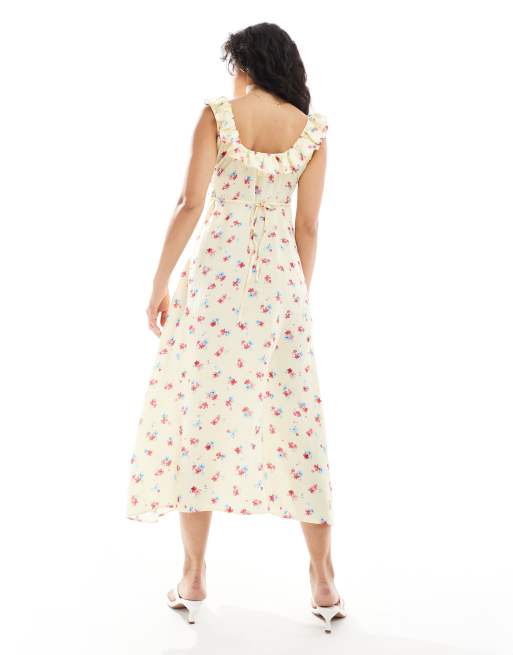 Vestido midi amarillo con lazada en la espalda y estampado de florecitas de New Look, 3 de 4