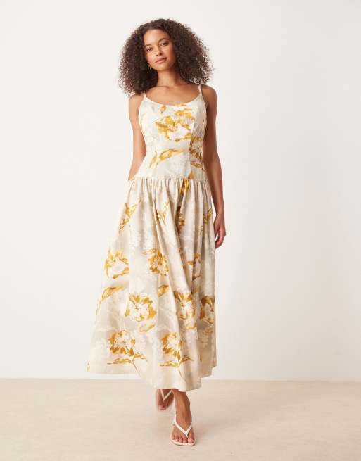 Vestido midi amarillo de tirantes con estampado floral, cintura baja y detalle de costuras premium de ASOS DESIGN