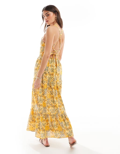 Vestido midi amarillo escalonado con estampado floral de Mango