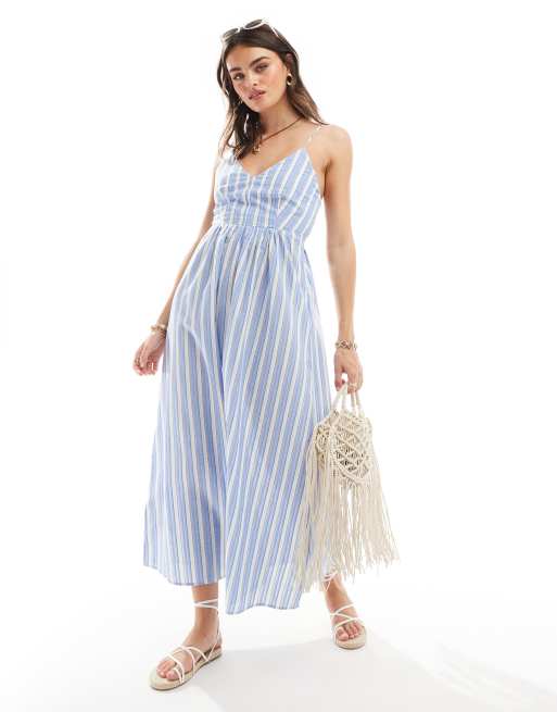 Vestido midi azul a rayas de tirantes de Mango