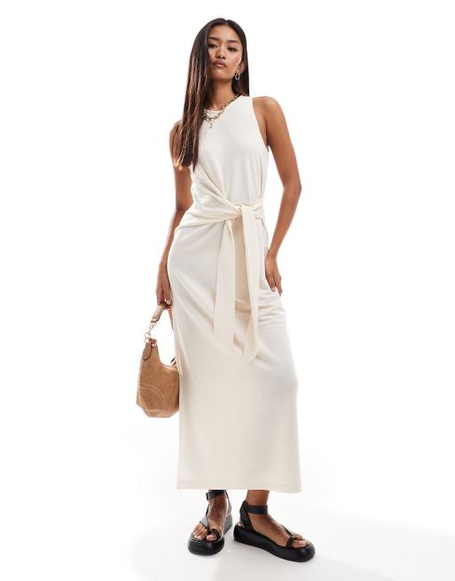 Vestido midi beis claro con detalle anudado en la parte delantera de Mango
