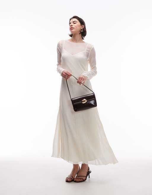 Vestido midi blanco marfil con diseño 2 en 1 y detalle de costuras de malla de Mango 