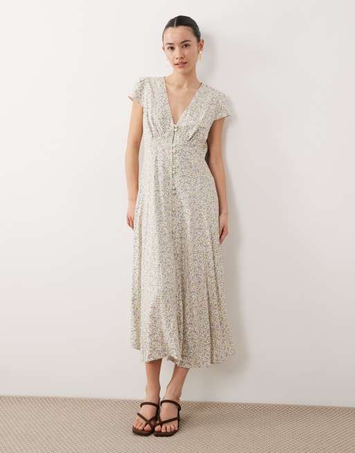 Vestido midi color crema con estampado floral, mangas de casquillo y cuello de pico Avery de Nobody's Child Petite