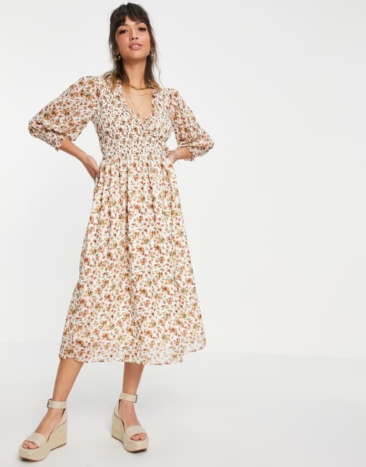 Vestido midi color crema holgado con punos fruncidos y estampado de flores de ASOS DESIGN ASOS