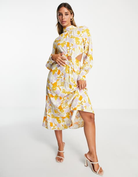 Vestido Amarillo shifón con tirantes y estampado de flores. - El Vestidor