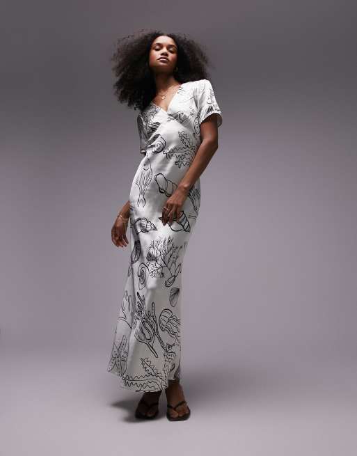 Vestido midi de corte al bies y manga corta con estampado de conchas de Topshop