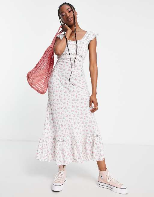 Vestido midi de plumeti con estampado de rosas e insertos de encaje de Miss Selfridge