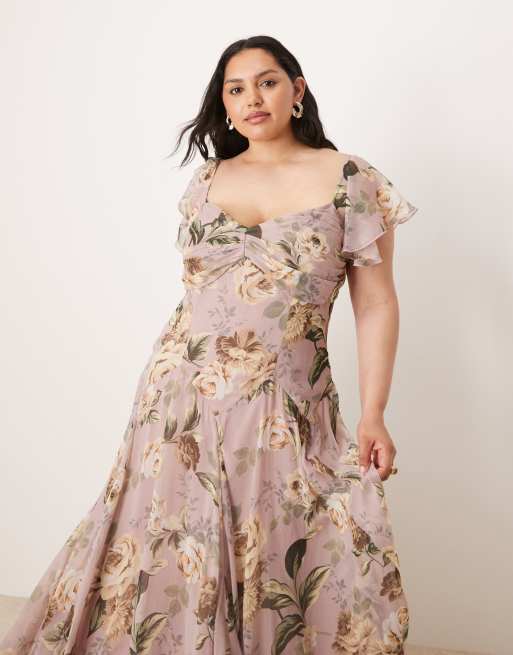 Vestido midi lila con estampado floral, cintura baja y falda de