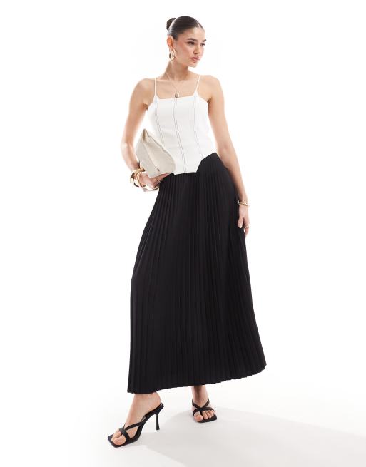Vestido midi monocromático con detalle de corsé en contraste y falda plisada de Extro & Vert