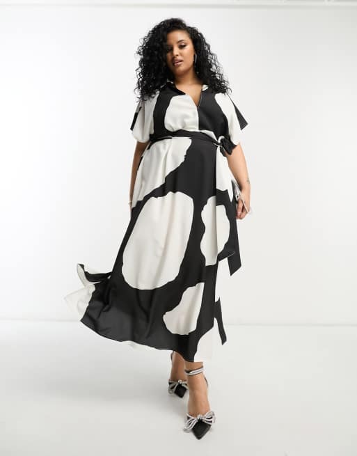 Vestido midi monocromático estampado con cinturón y cuello de pico