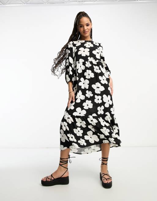 Vestido midi negro amplio con cuello alto, estampado floral y mangas abullonadas de New Look
