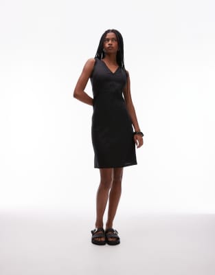 Vestido midi negro de corte recto con cuello de pico y ribete de volante de tejido rico en lino de ARKET - view 1