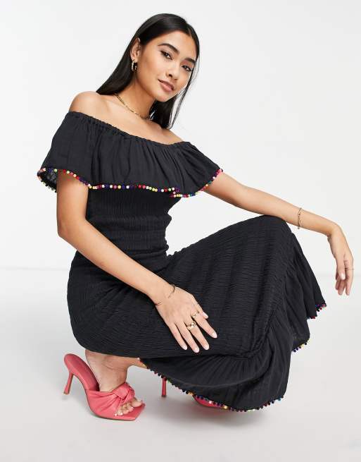 Vestido midi negro fruncido con pompones Jojo de Never Fully Dressed
