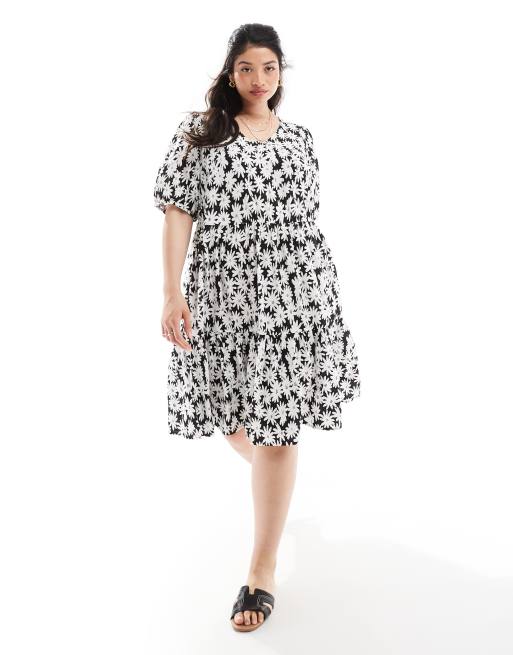 Vestido midi negro y blanco escalonado con estampado floral de Yours 