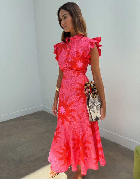 Vestido midi rosa y rojo con estampado de sol, cuello alto y volantes en las mangas Frida de Never Fully Dressed - view 1